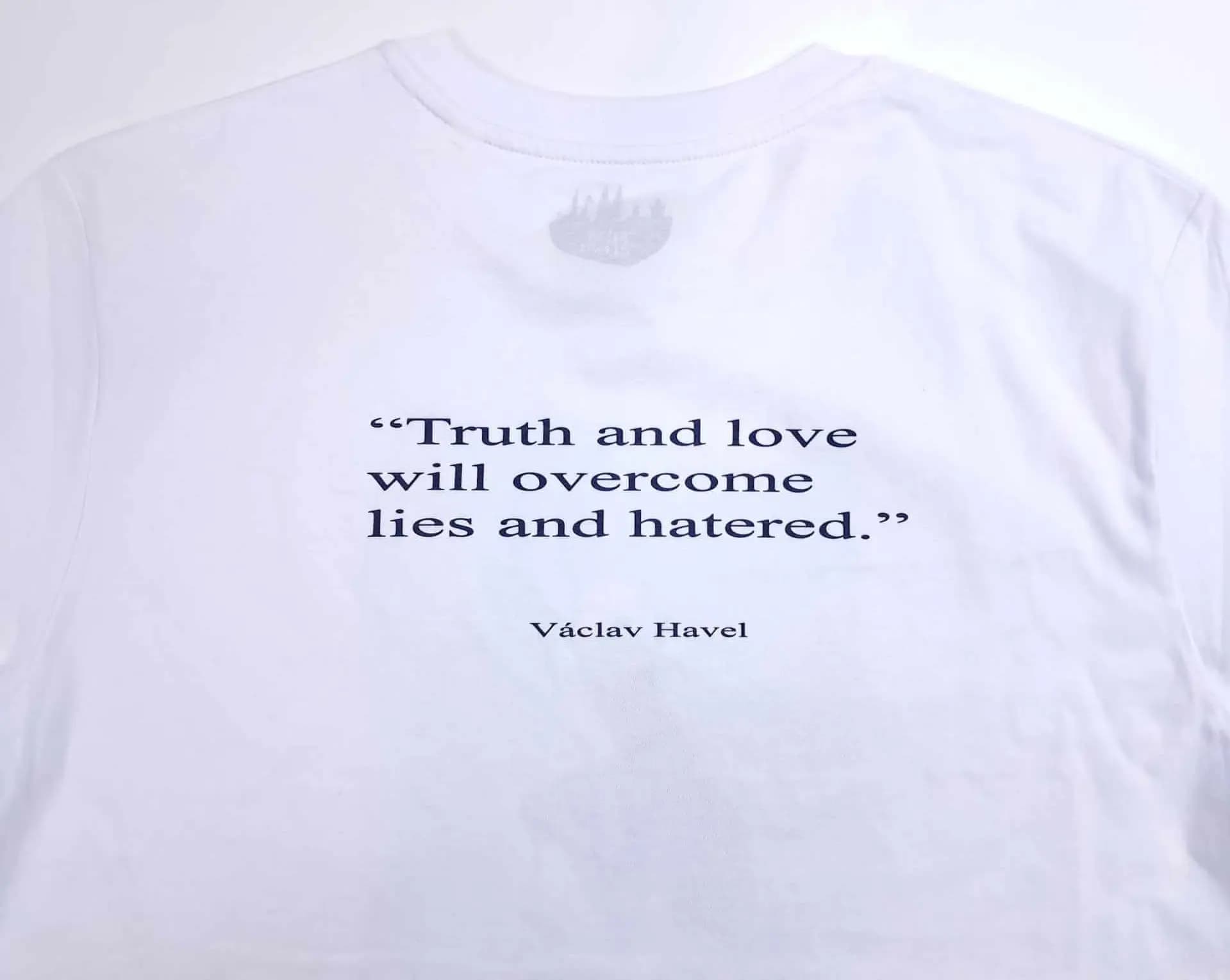 Back of the white Václav Havel T-shirt with the quote “Truth and love will overcome lies and hatred.”