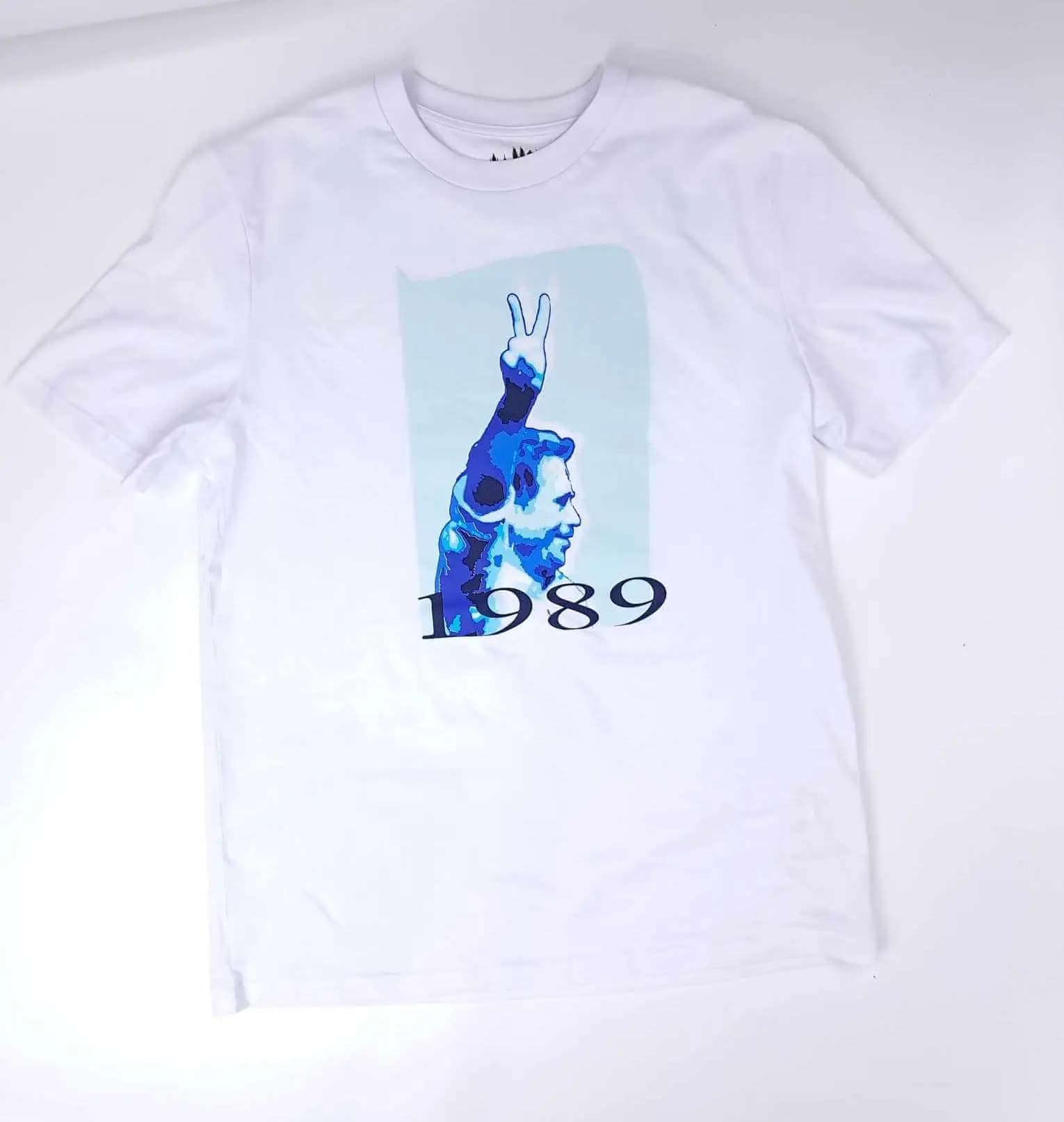 White T-shirt with a blue Václav Havel portrait, victory sign and the year 1989, shown laid flat.