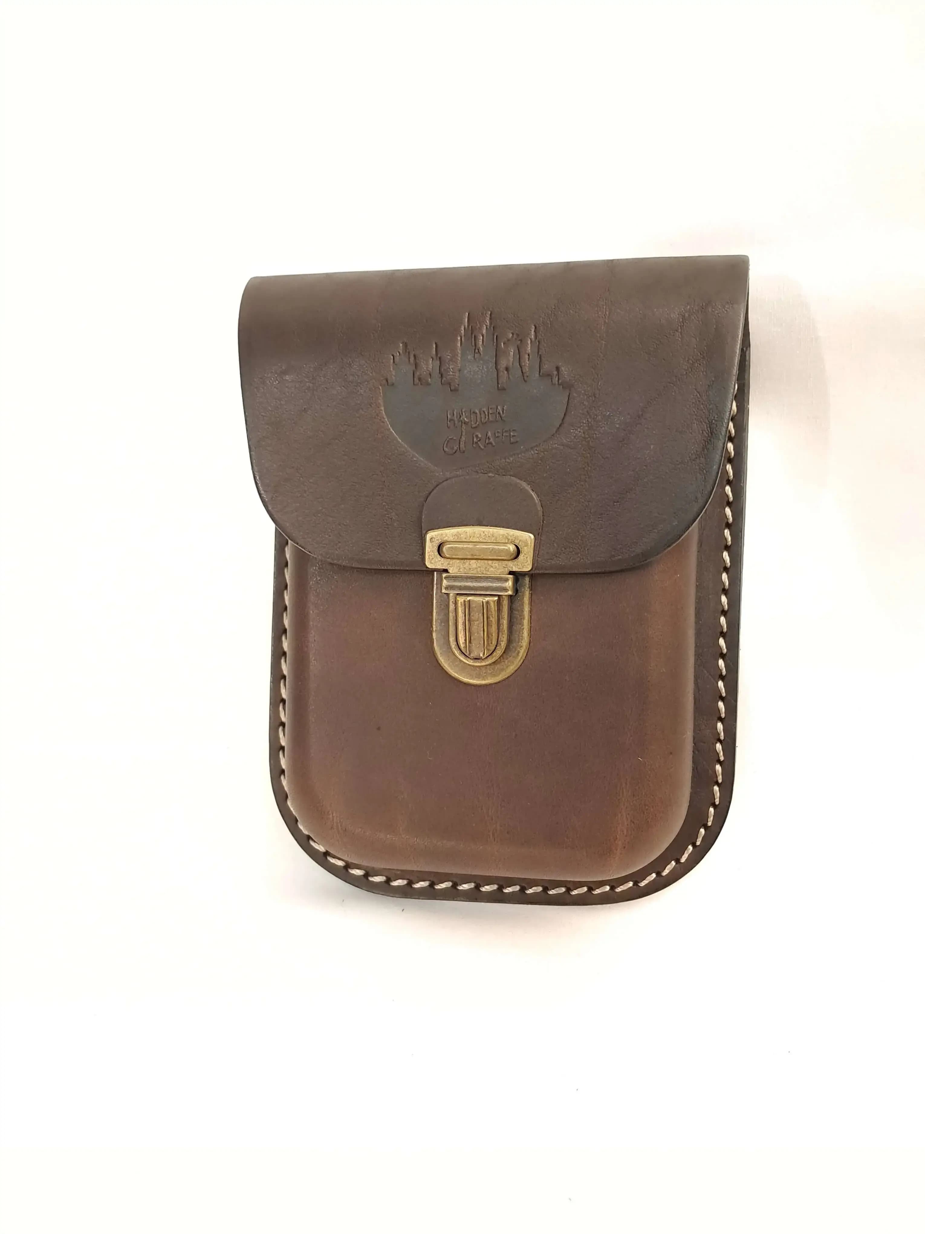 Brown leather Hidden Giraffe pouch with brass clasp